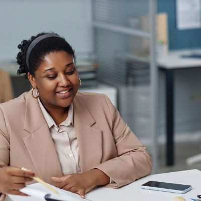 Professional female works at a desk